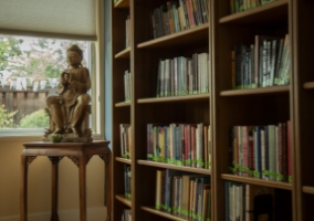 A library of more than 1,600 Buddhist books in a sun-filled room
